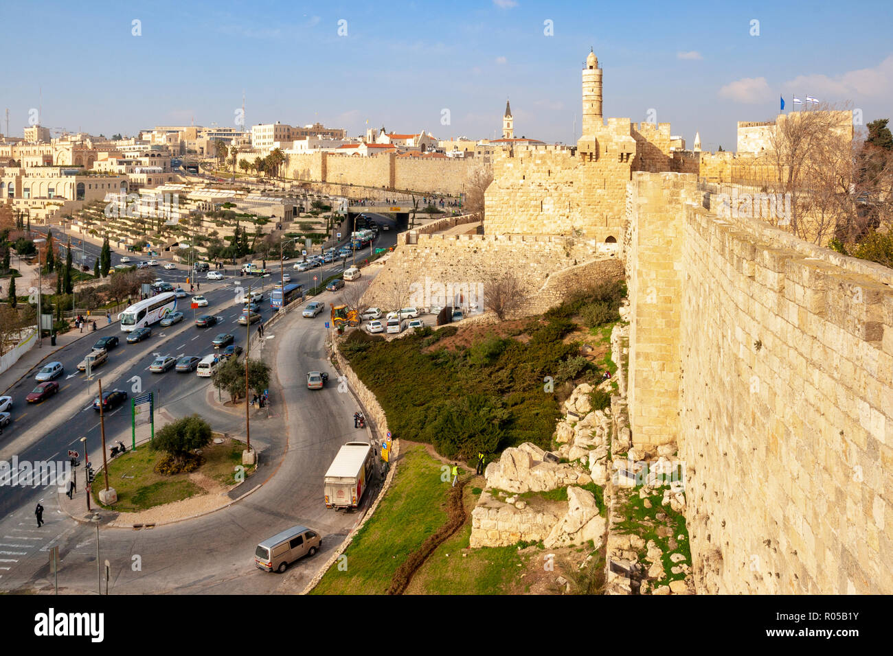JERUSALEM - JAN 24, 2011: View from the old city wall of Jerusalem on the Tower of David and traffic around the city centre. Stock Photo