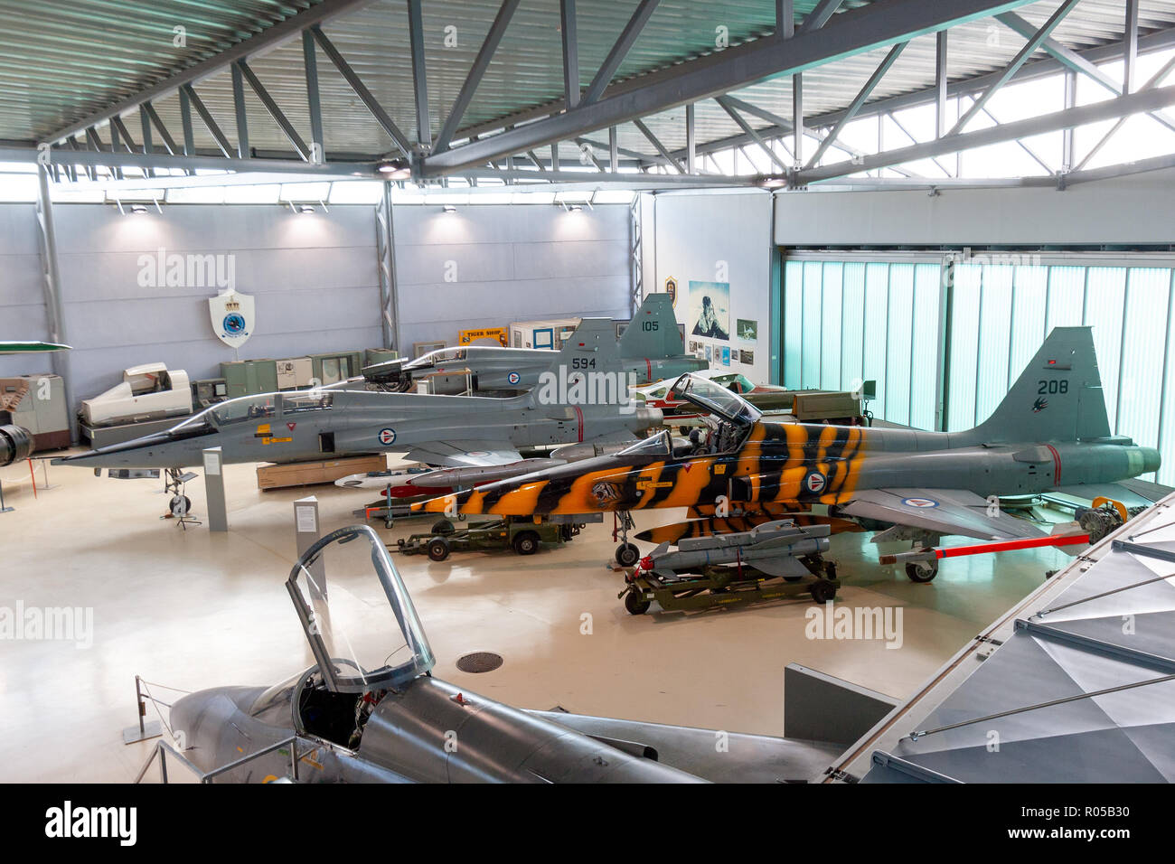OSLO, NORWAY - JUL 16, 2011: Royal Norwegian Air Force F-5 Tiger fighter jets on display in the Norwegian Armed Forces Museum at Oslo-Gardermoen airpo Stock Photo