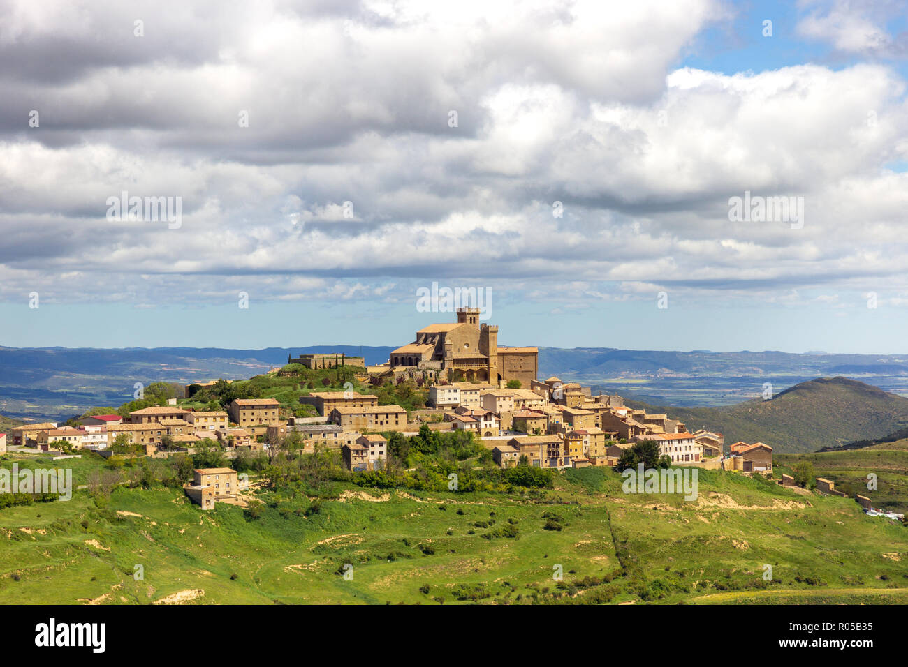 View on the Spanish town Ujue (Uxue in Basque) and its 12th century fortified church in Navarre, Spain Stock Photo