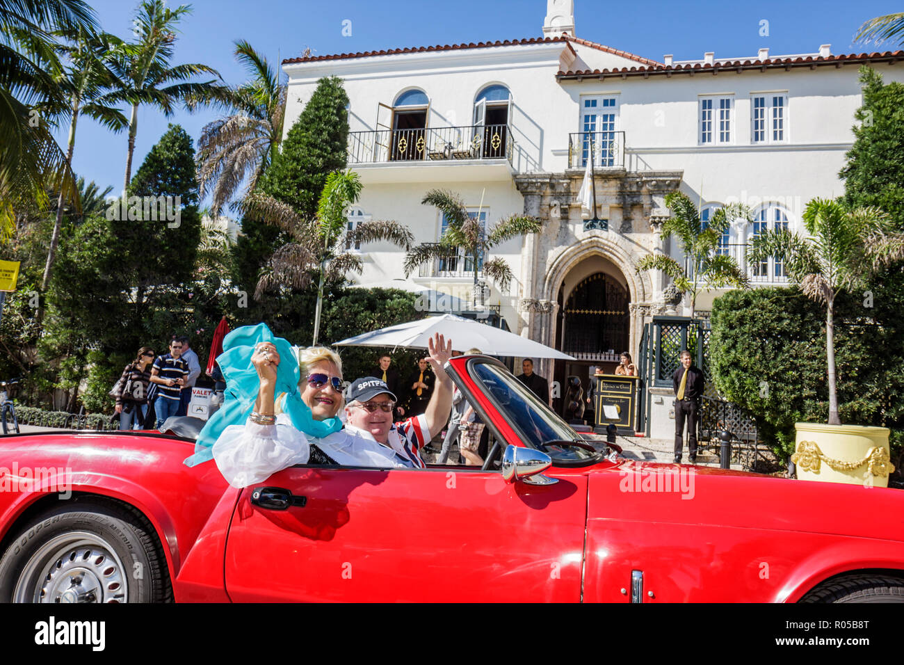 Miami Beach Florida,Ocean Drive,Art Deco Weekend,architecture festival parade,crowd,classic car,vintage,convertible,man men male,woman female women,co Stock Photo