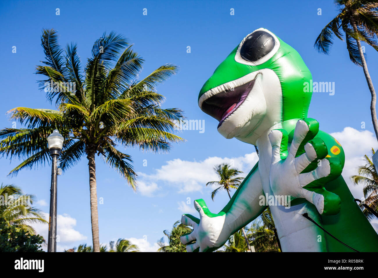 Miami Beach Florida,Ocean Drive,Art Deco Weekend,GEICO,gecko,mascot,logo,ad,advertising,ad,car,auto,insurance,company,name branding,campaign,inflatabl Stock Photo