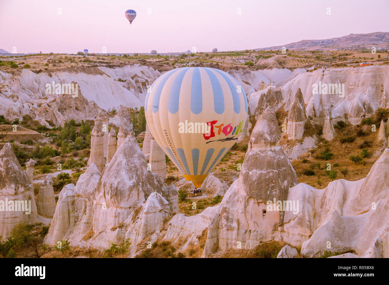 Cappadocia - Turkey - August 2018: Hot air balloon fly at sunrise . Stock Photo