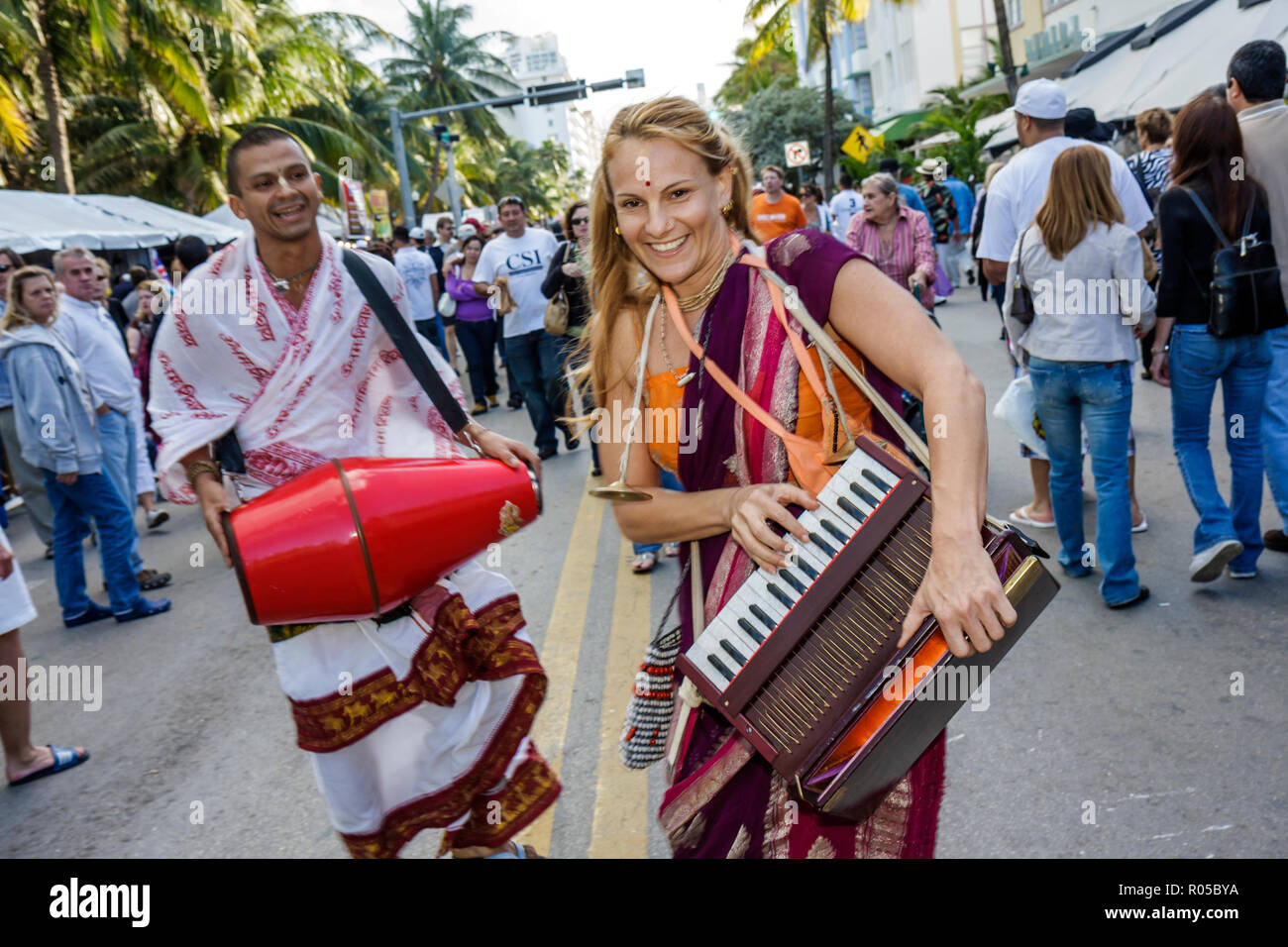 Miami Beach Florida,Ocean Drive,Art Deco Weekend,architecture festival Hispanic man men male,woman female women,crowd,keyboard,drums,sect,Hare Krishna Stock Photo