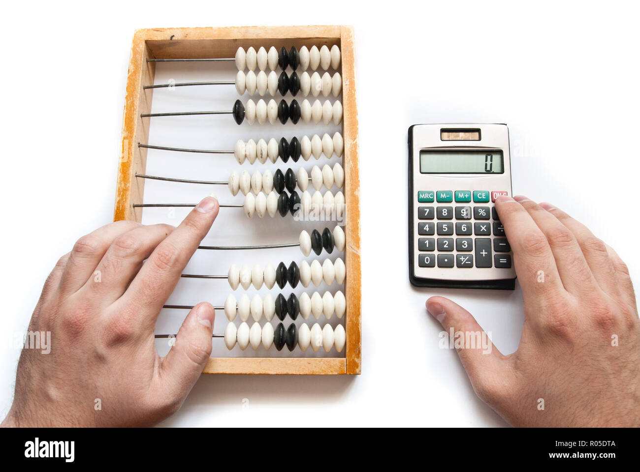 old abacus with calculator and hands Stock Photo - Alamy