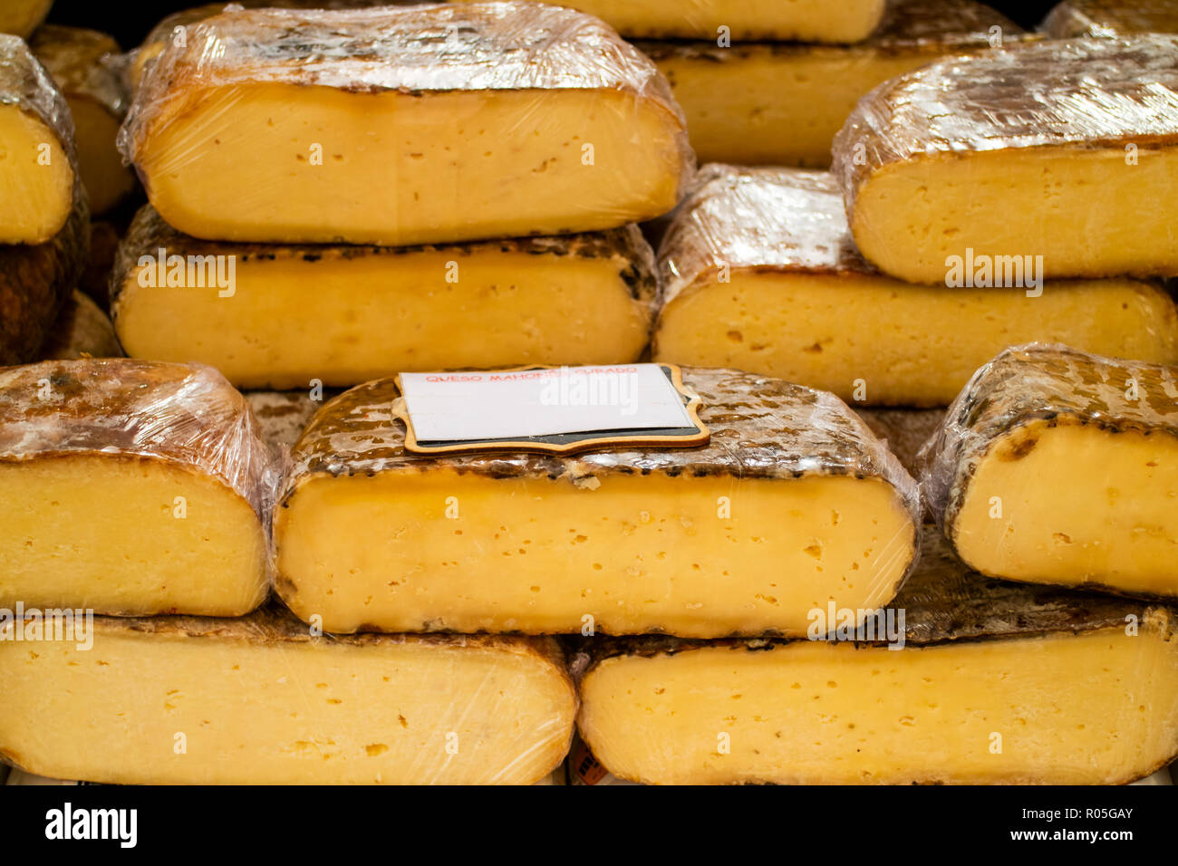 cured Mahón cheese produced in Menorca, Balearic Islands, Spain Stock Photo
