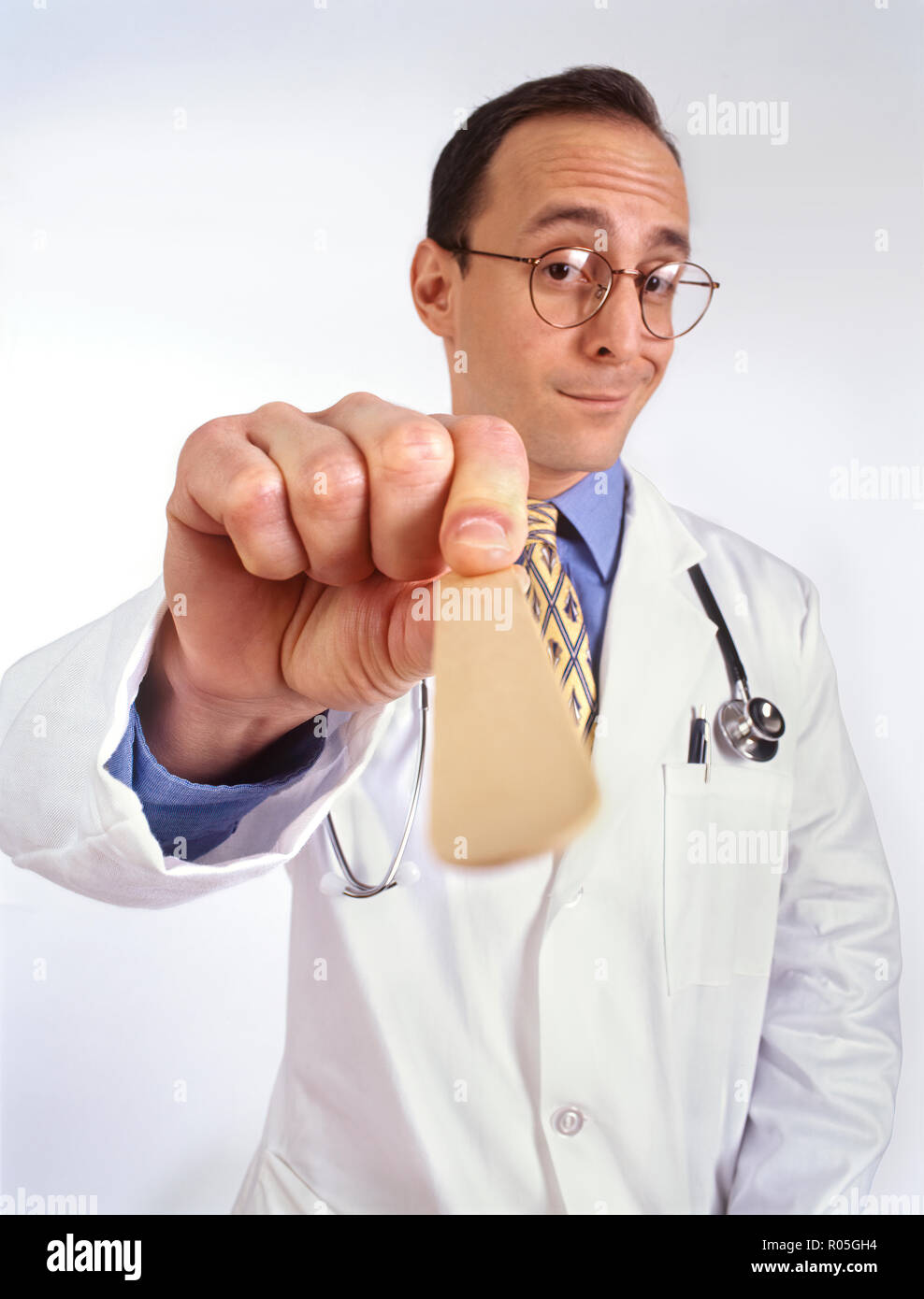 A doctors visit from a patient's personal perspective or view and doctor looking into patients mouth Stock Photo