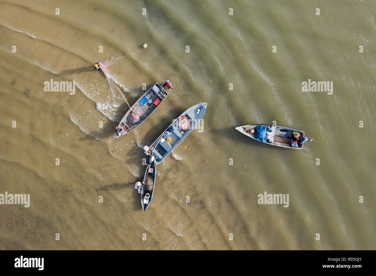 An Aerial Top Angle View Drone Camera Of Coastal Fisherman Netting Using Pump Boat At Sabah Malaysia Seafront Stock Photo Alamy