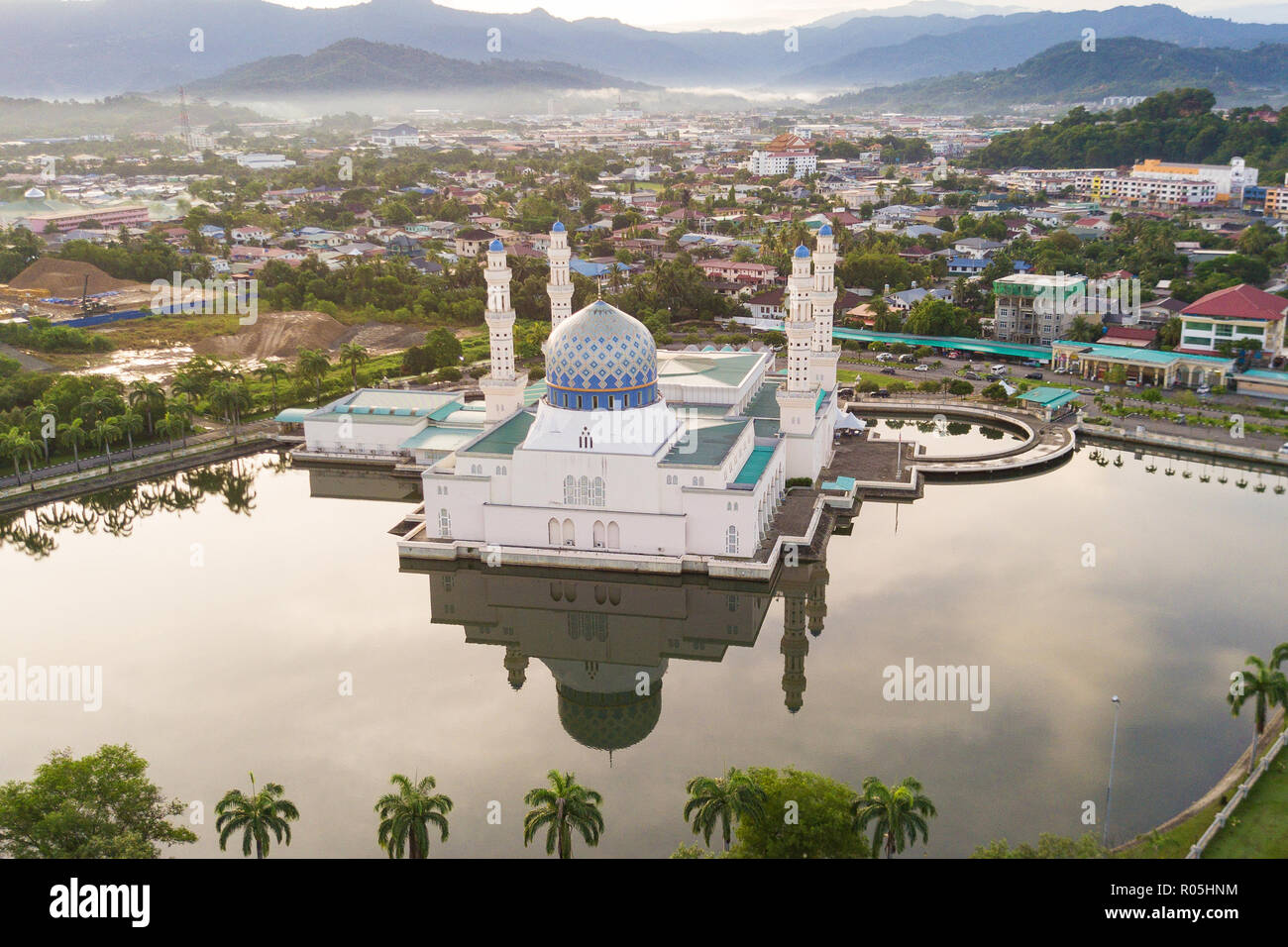 An aerial drone top angle view of Kota Kinabalu City Mosque  and its surrounding. Stock Photo