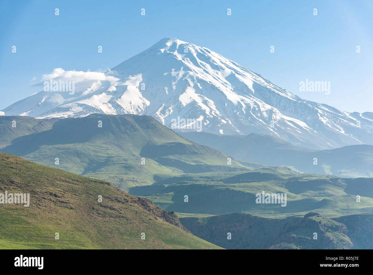Mount Damavand (5.610m) , snow capped and potentially active volcano, highest peak in Iran and highest volcano in Asia. Stock Photo