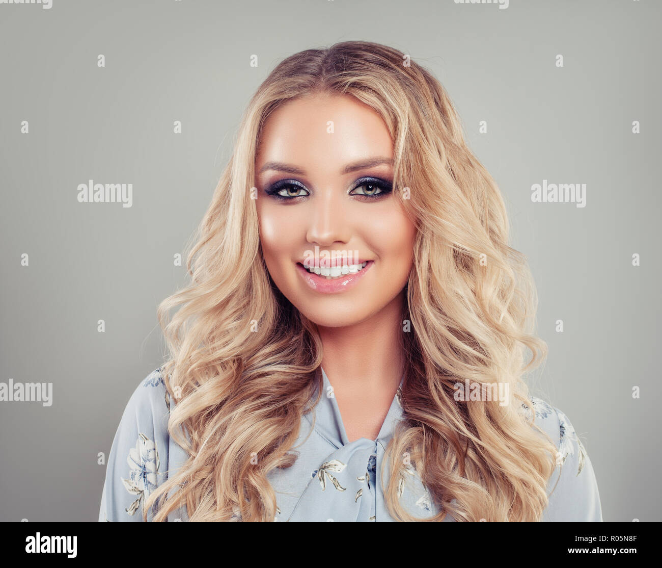 Beautiful female model smiling. Young woman face Stock Photo - Alamy