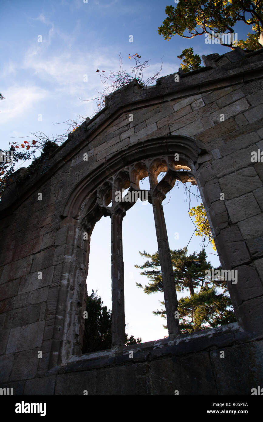 Exterior of Castell Penrhyn Castle, Bangor, North Wales in bright Autumn sunshine with blue skies Stock Photo