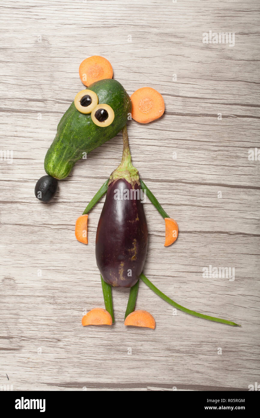 Funny rat made with eggplant and cucumber Stock Photo