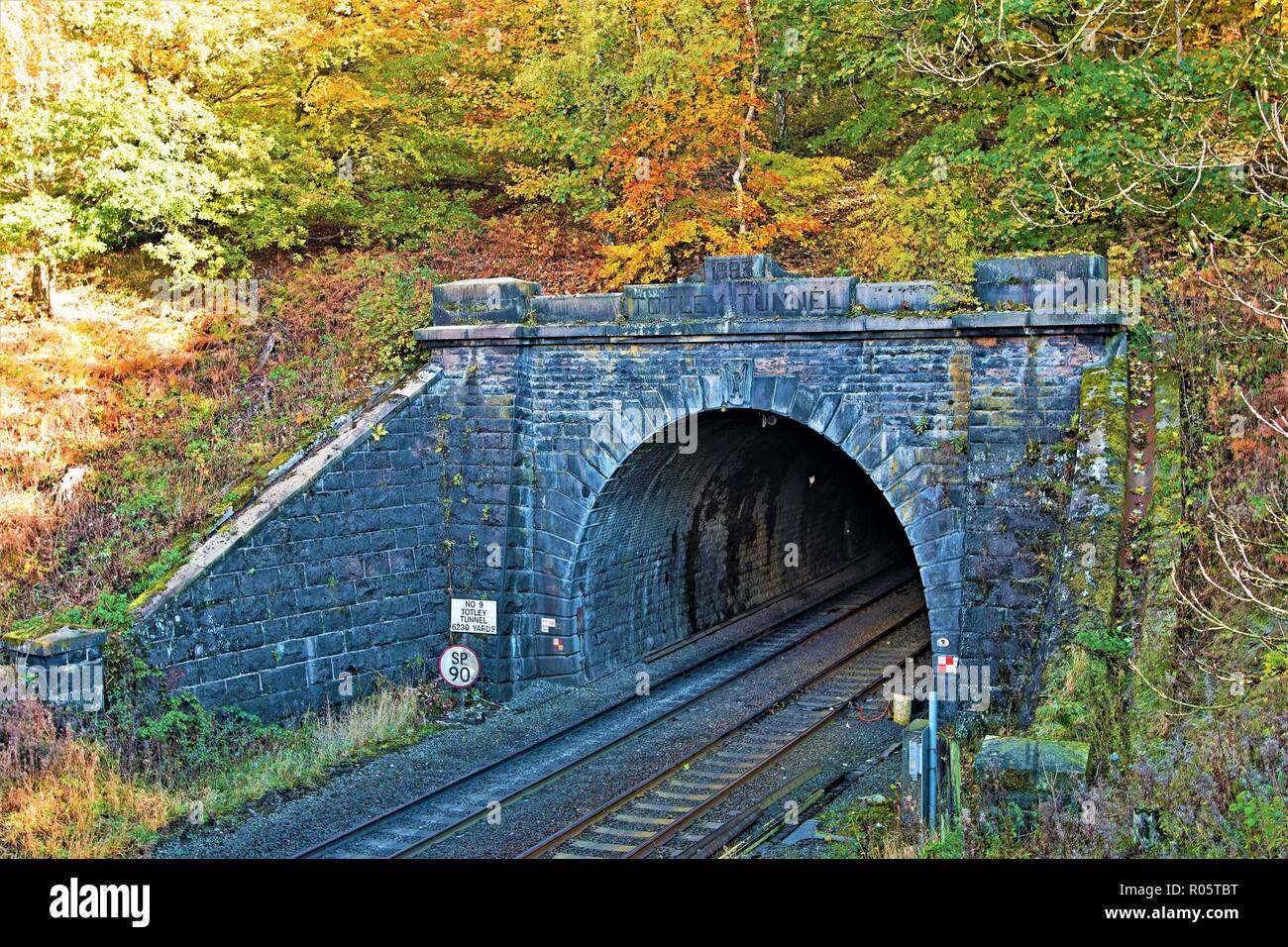 Capturing the railway network, through Totley tunnel into Grindlebrook station, in Derbyshire. Stock Photo