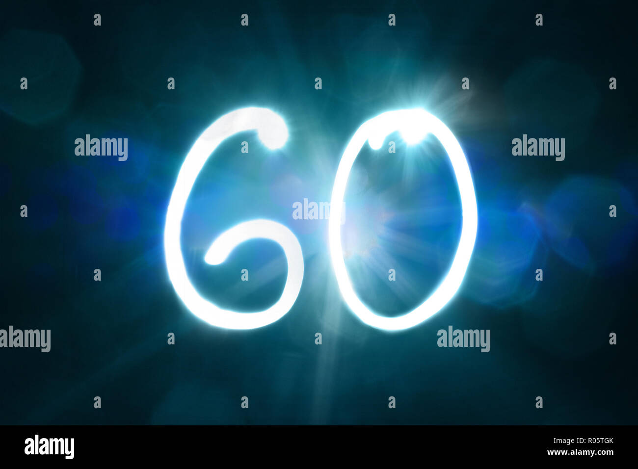 sixty light sparkle shine number anniversary year Stock Photo