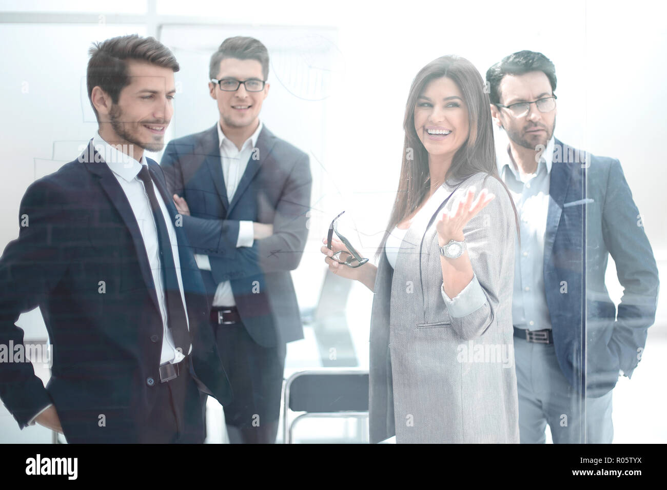 group of business people standing in a modern office.meetings and ...