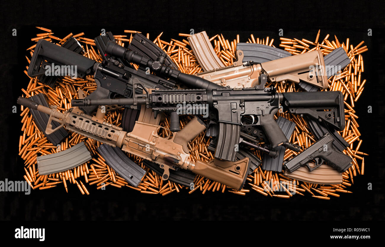 Assault rifle weapon and live ammunition Stock Photo