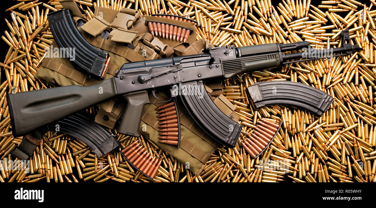 Assault rifle weapon and live ammunition Stock Photo