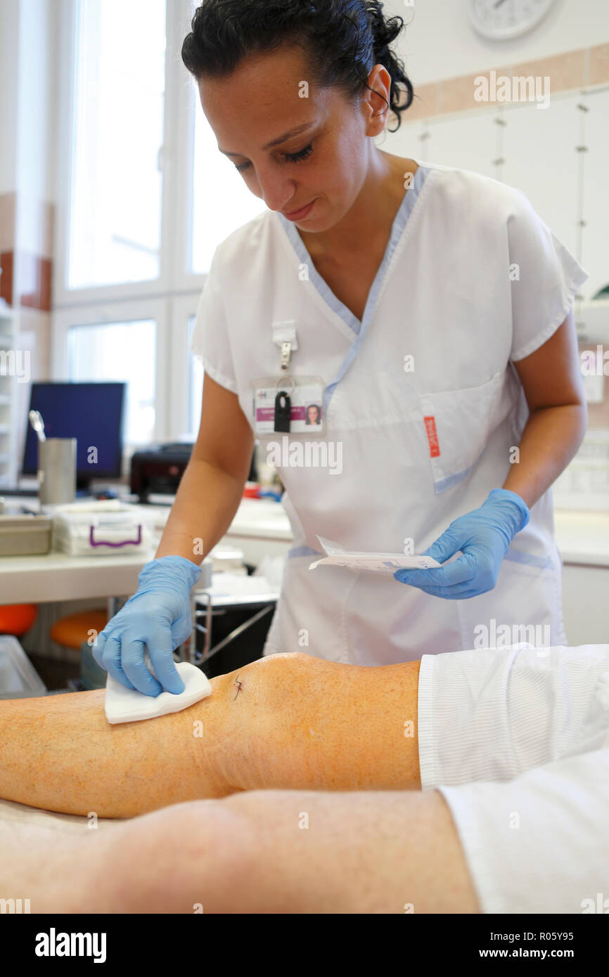 Nurse treats the knee, surgery department, health service, Czech Republic Stock Photo
