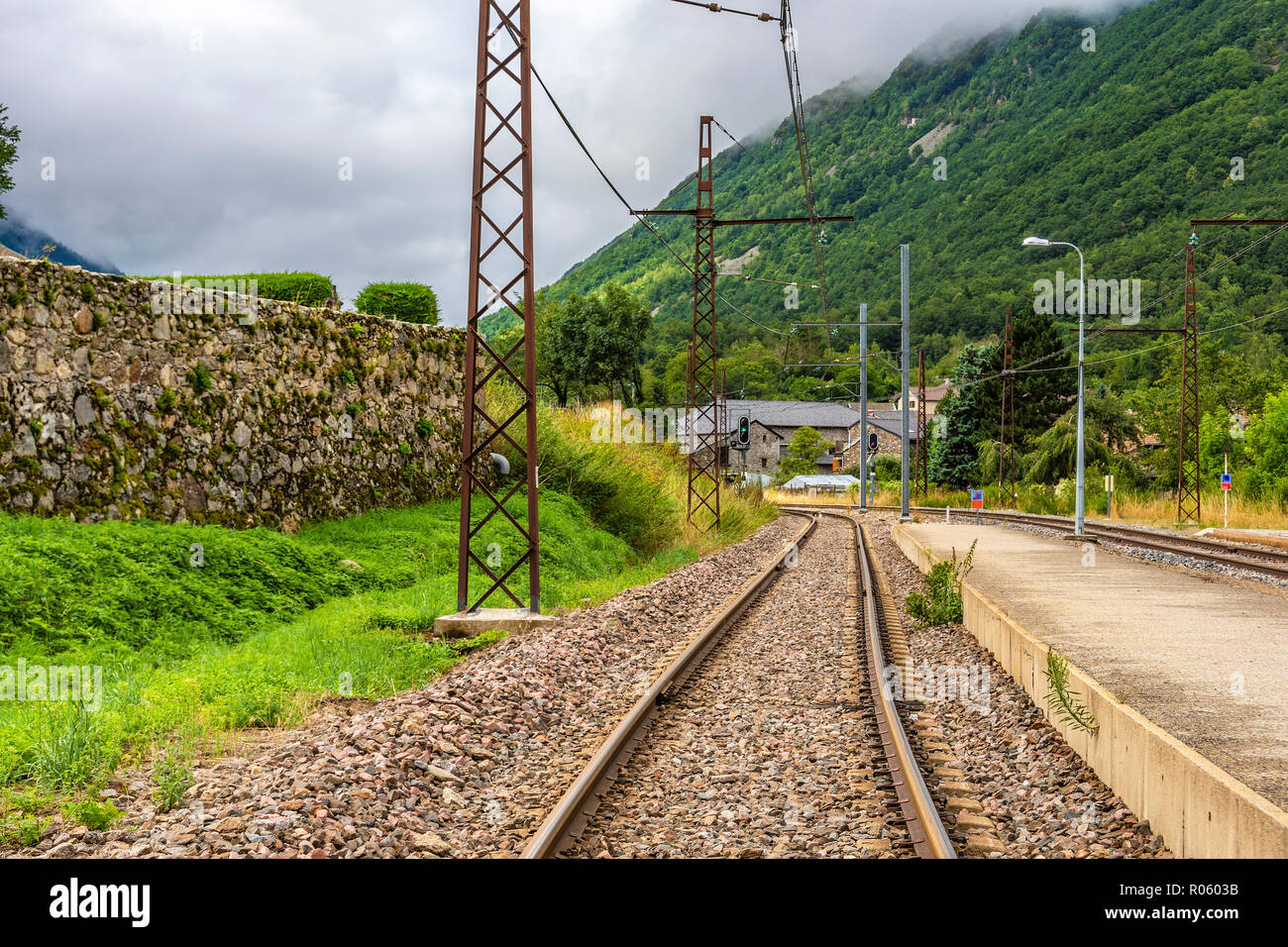Views of the railroad tracks in the Pyrenees near Andorra in the French village of Merens-les-vals. Ariege France Stock Photo