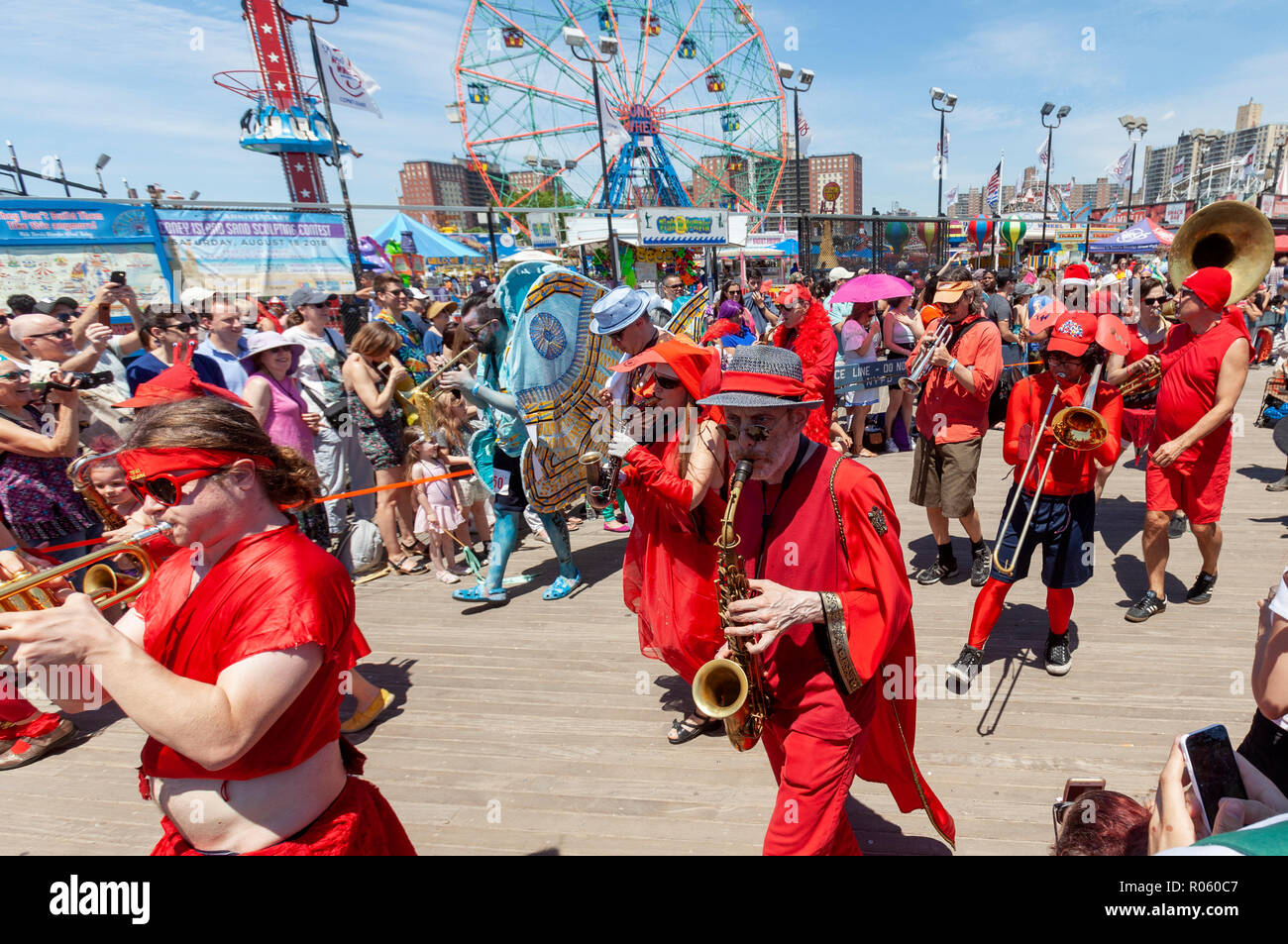 People having fun watching the Annual Mermaid Parade at Coney Island