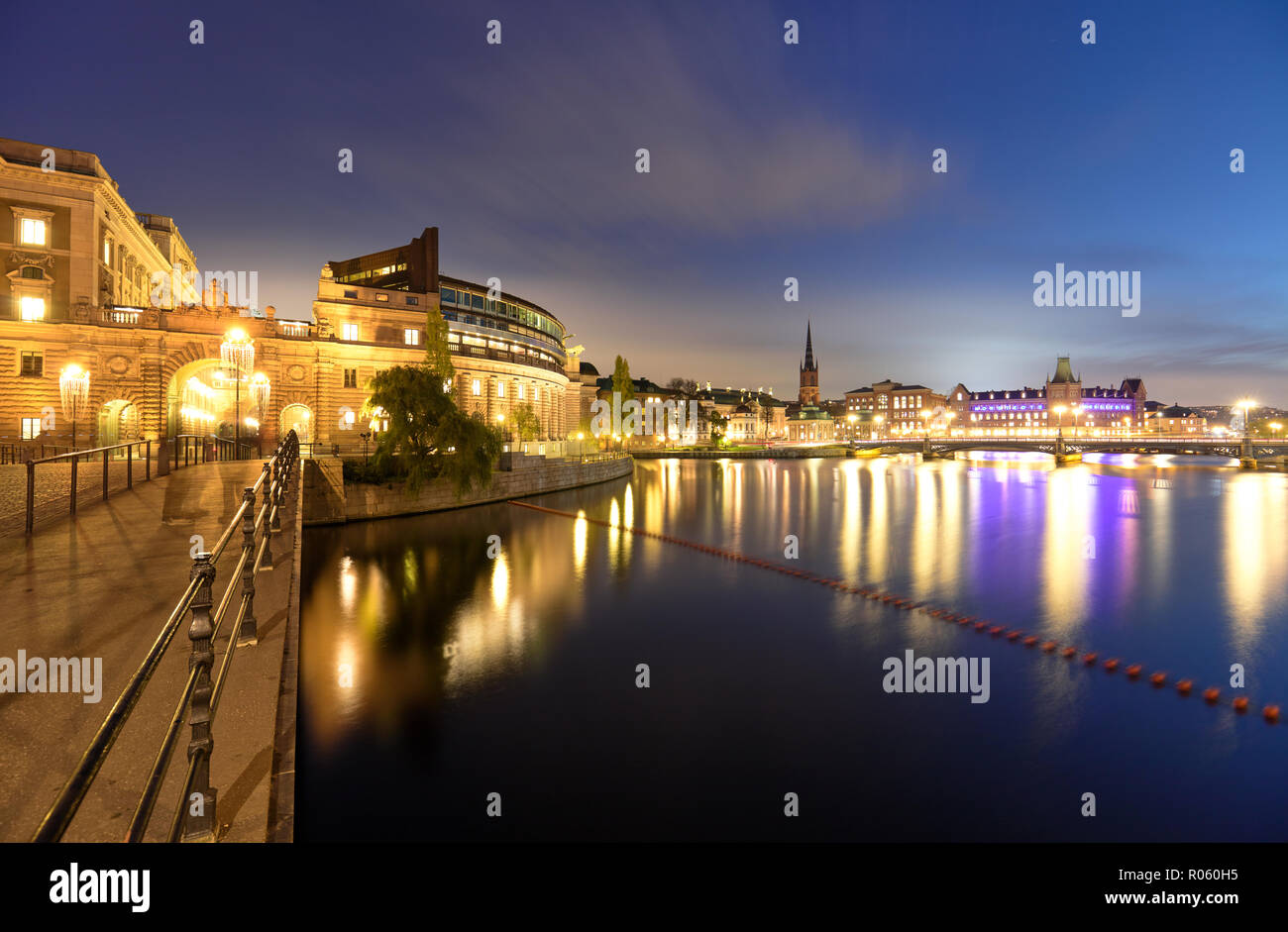 Twilight view from Riksbron with the Swedish Parliament building, Gamla Stan and Riddarholmen in the frame - in Stockholm, Sweden Stock Photo