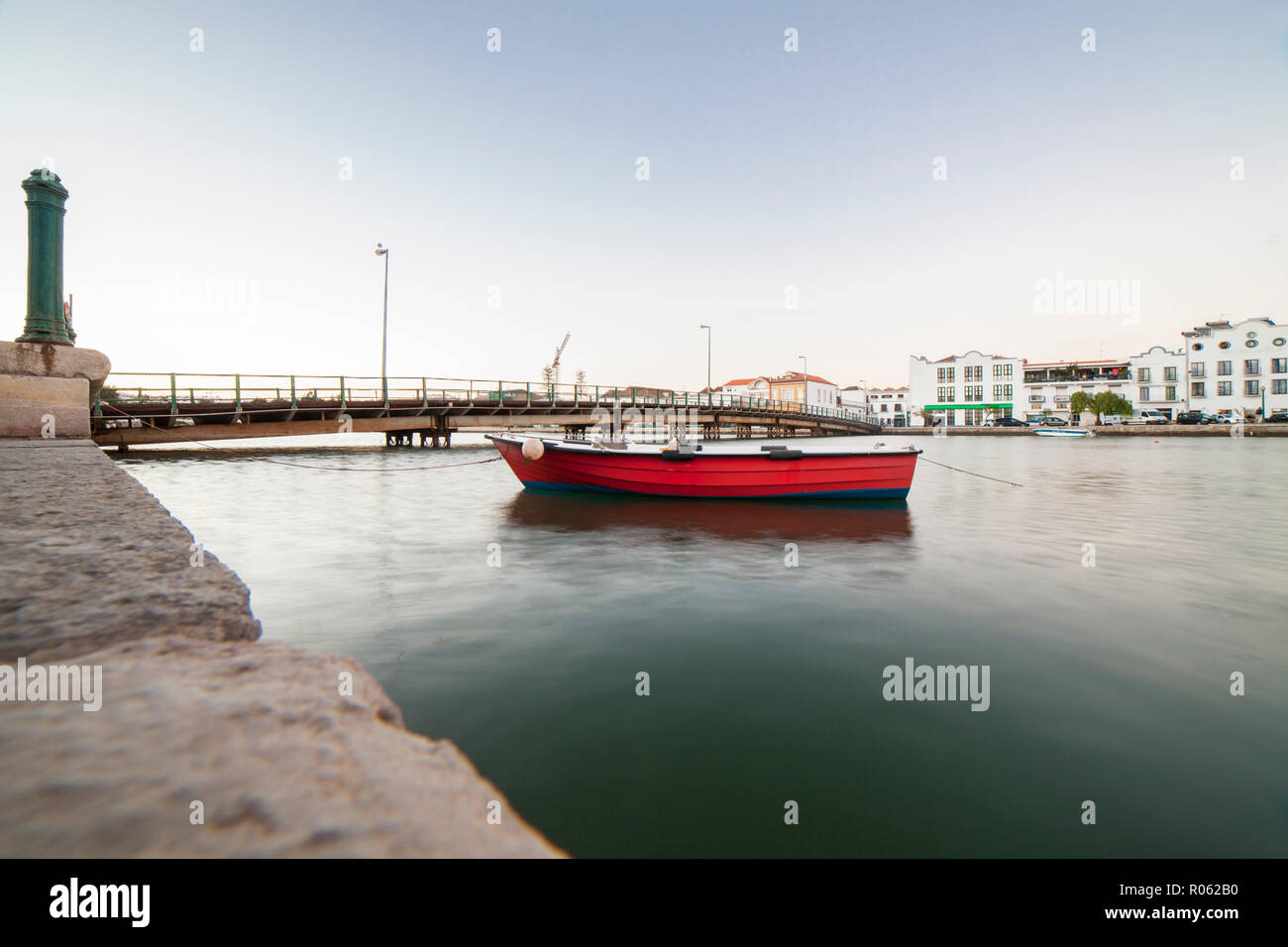 Red fishing boat at the mooring near Tavira down town, Algarve, Portugal Stock Photo