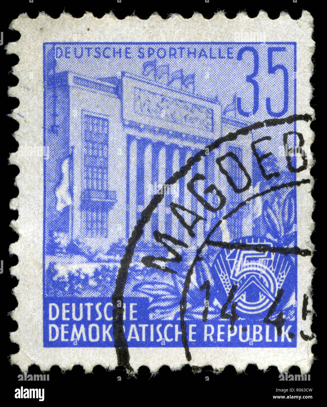 Postmarked stamp from the East Germany in the Five-year Plan series Stock Photo