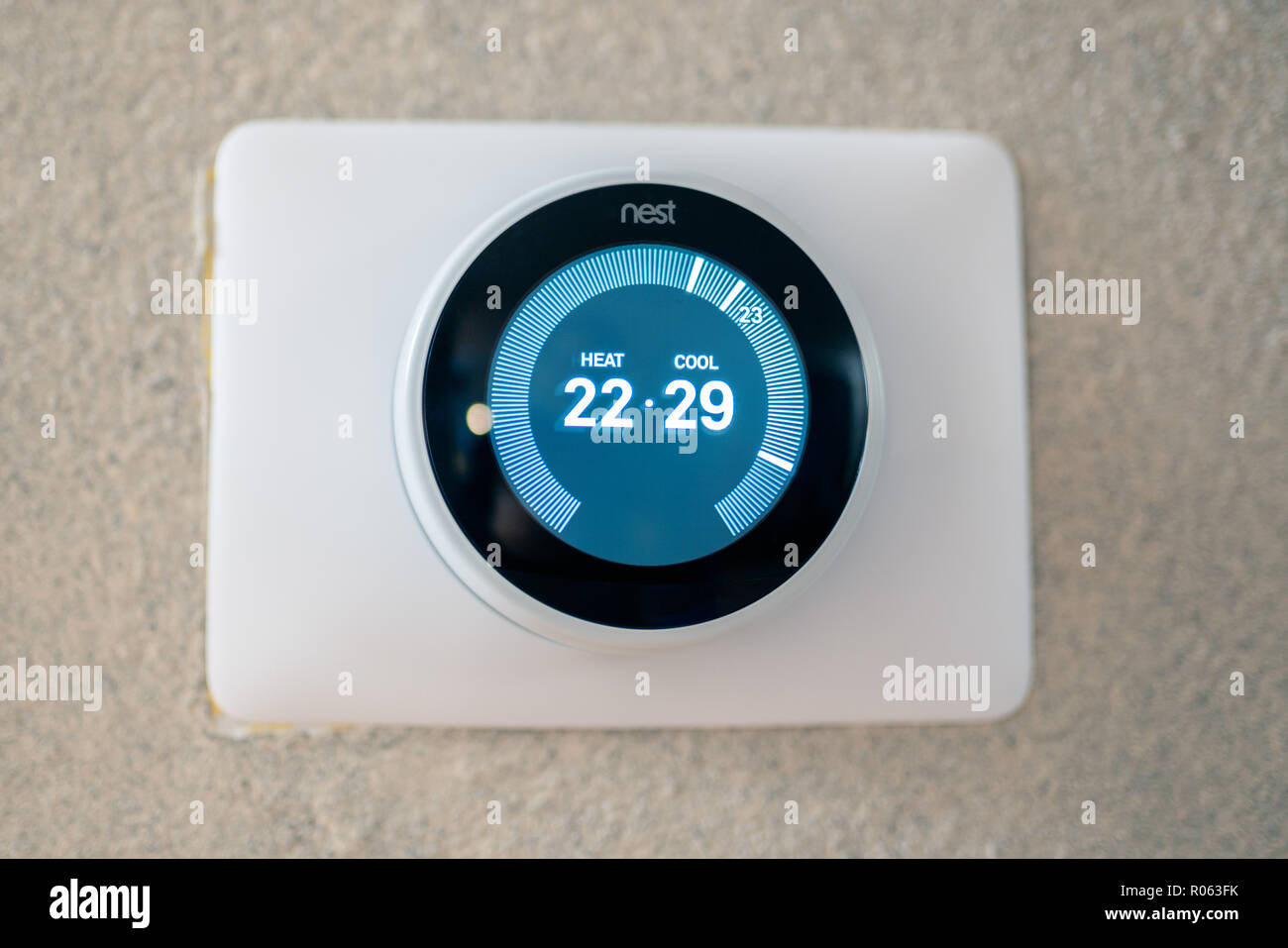 Portland Or Usa October 27 2018 Nest Thermostat On The The Textured Wall Showing Degrees In Celsius Portland Or Usa October 27 2018 Nest Thermostat On The The Textured Wall Showing Degrees In Celsius