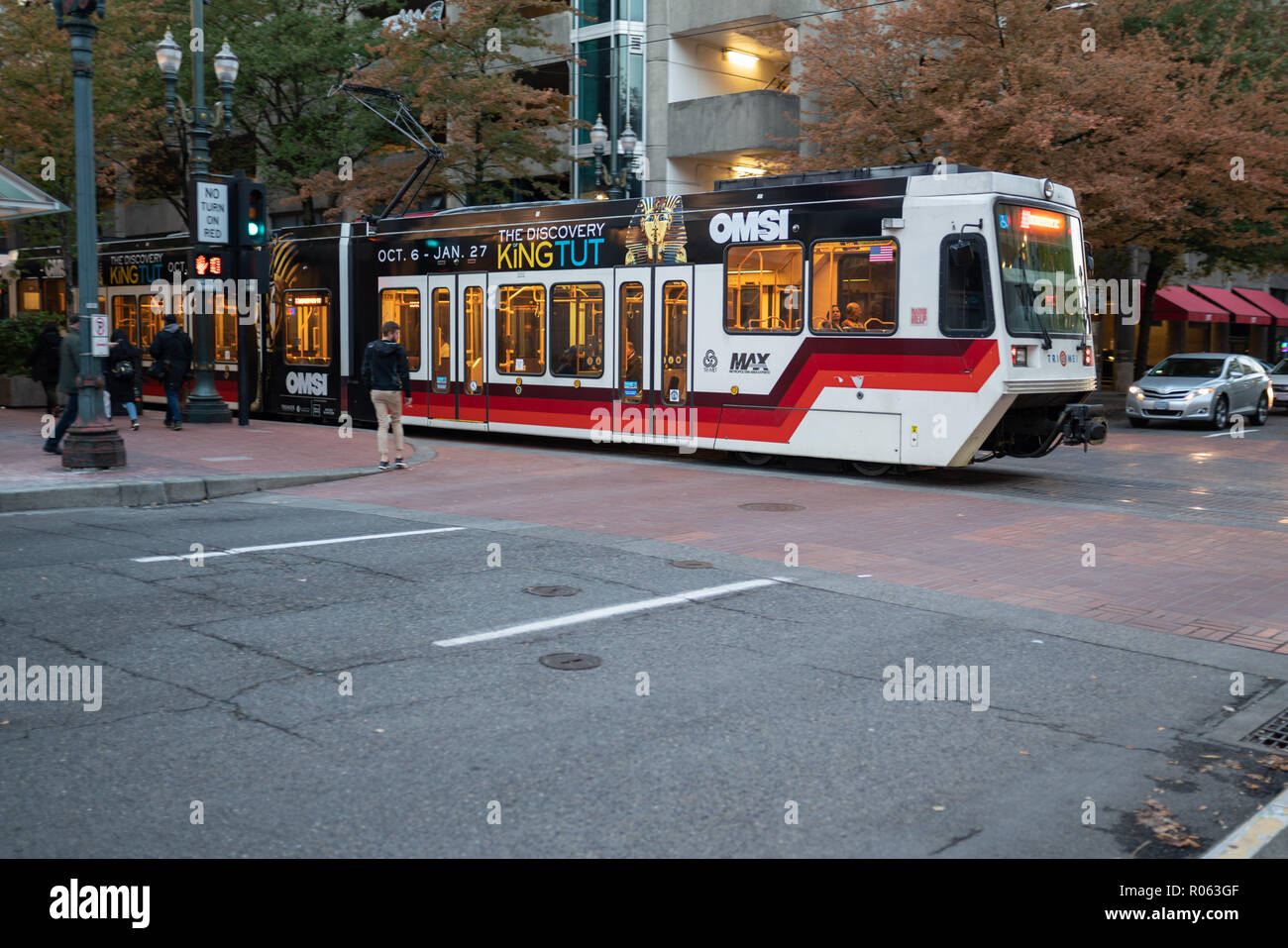 Portland, OR / USA October 6 2018 Trimet light rail train crossing an intersection in