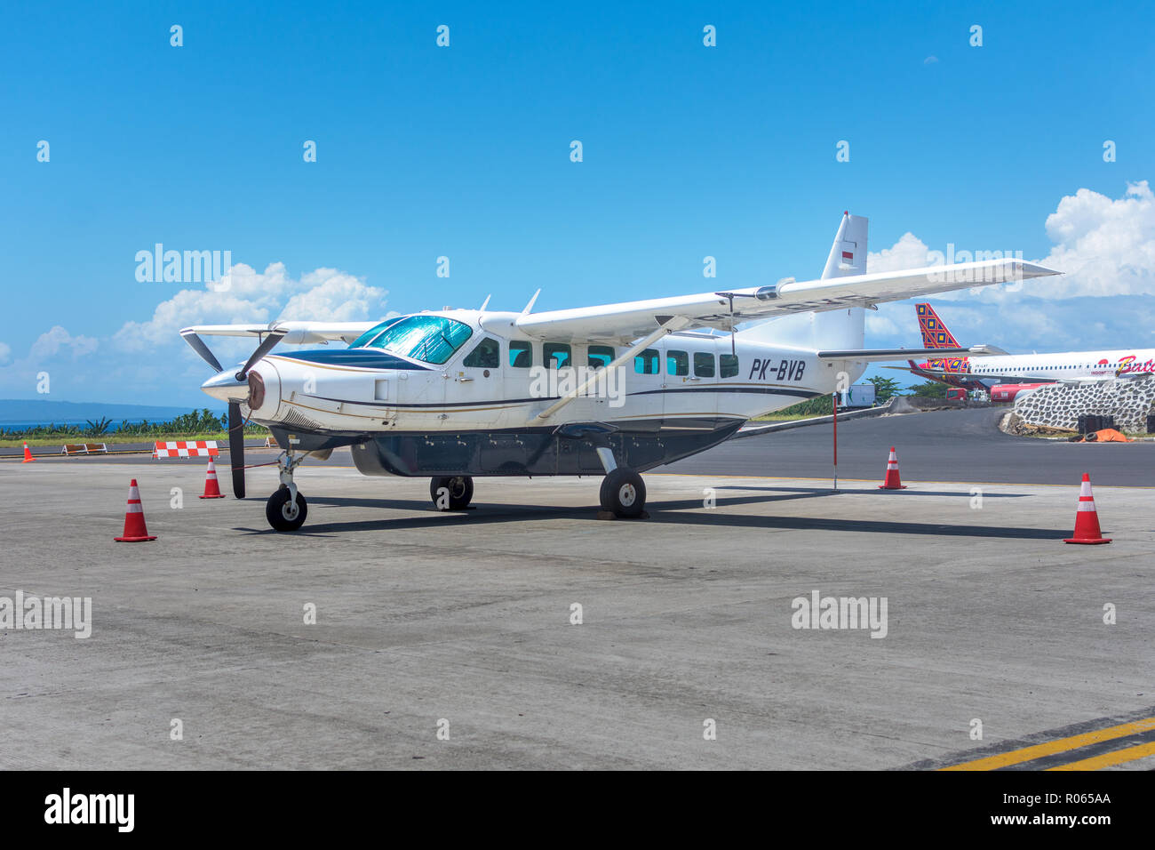 a small airplane parked at the airport Stock Photo - Alamy
