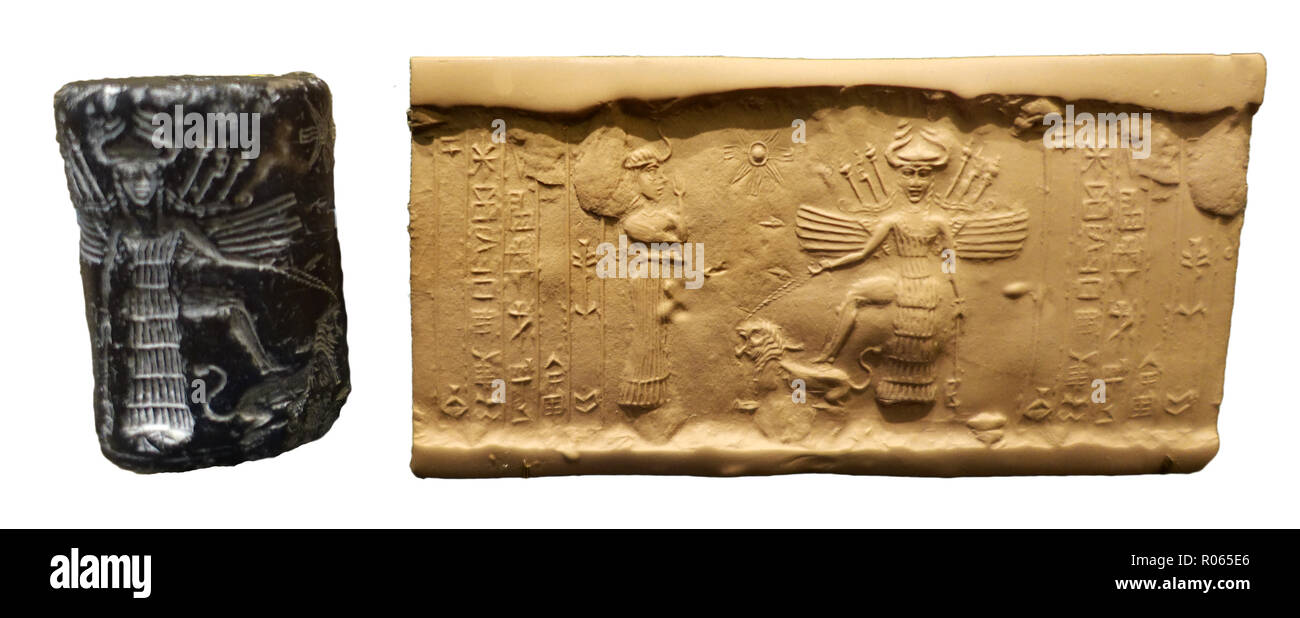 6367. Mesopotamian winged Goddess Ishtar taming a lion  (center), Goddess Ninishkun on the left. Akkadian cylinder seal dating c. 2330-2150 BC. Stock Photo
