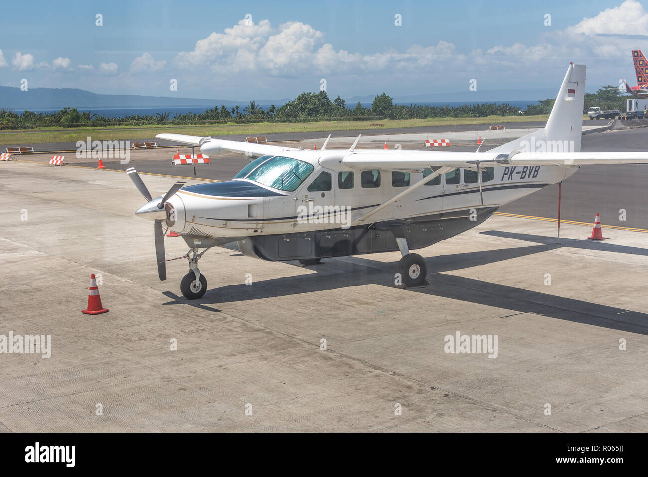 a small airplane parked at the airport Stock Photo - Alamy