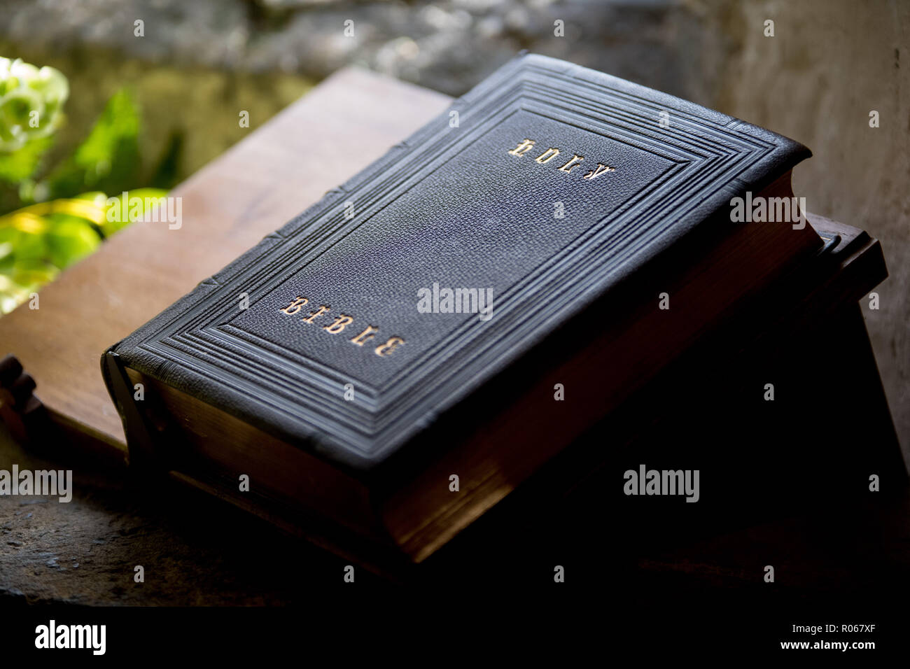 Holy bible inside a church in West Sussex, UK. Stock Photo