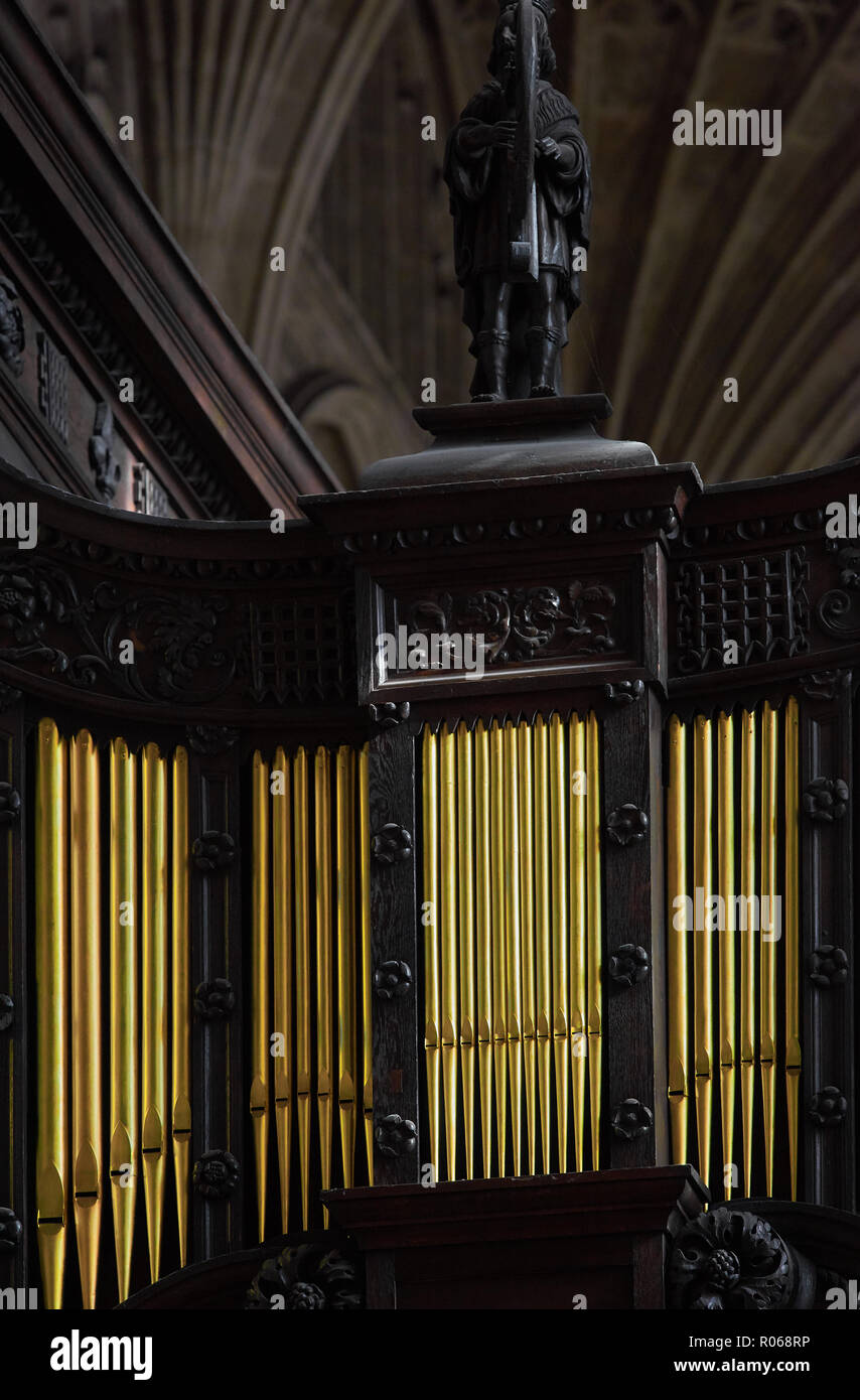 Organ pipes on the wooden rood screen in the tudor medieval chapel of King's college, university