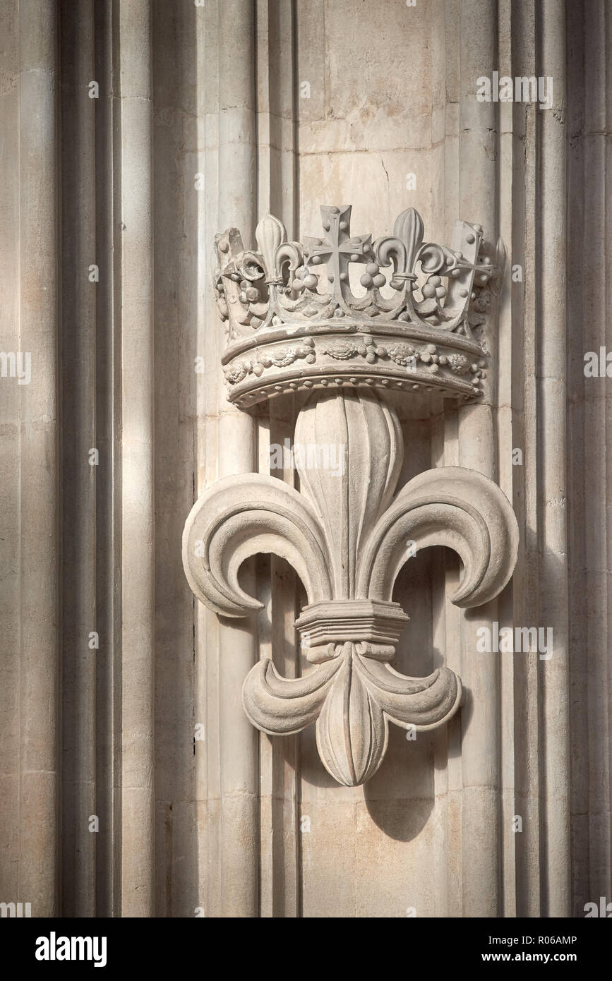 Carved stone royal emblem on the wall of the ante-chapel in the tudor medieval chapel of King's college, university of Cambridge, England. Stock Photo