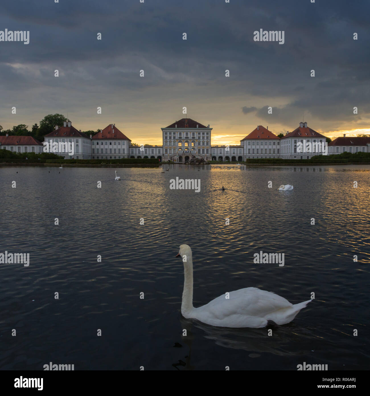 Dramatic scenery of post storm sunset of Nymphenburg palace in Munich Germany. Stock Photo