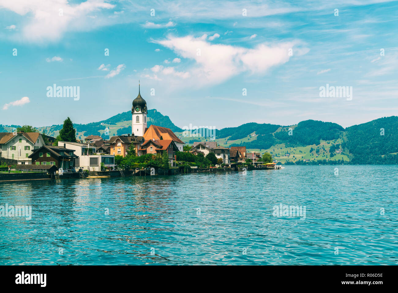 Beckenried village on Lucern Lake with the Catholic church of St. Heinrich seen in the middle, Beckenried, Nidwalden, Switzerland, Europe Stock Photo