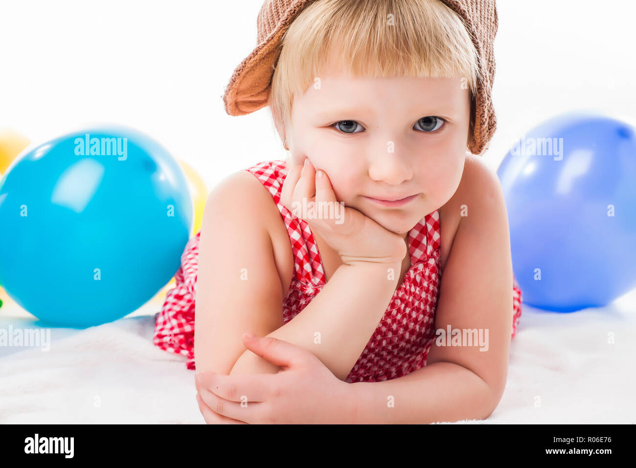 Cute Girl being serious and pensive Stock Photo