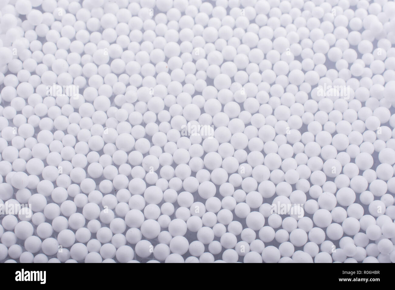 White little polystyrene foam balls as background Stock Photo