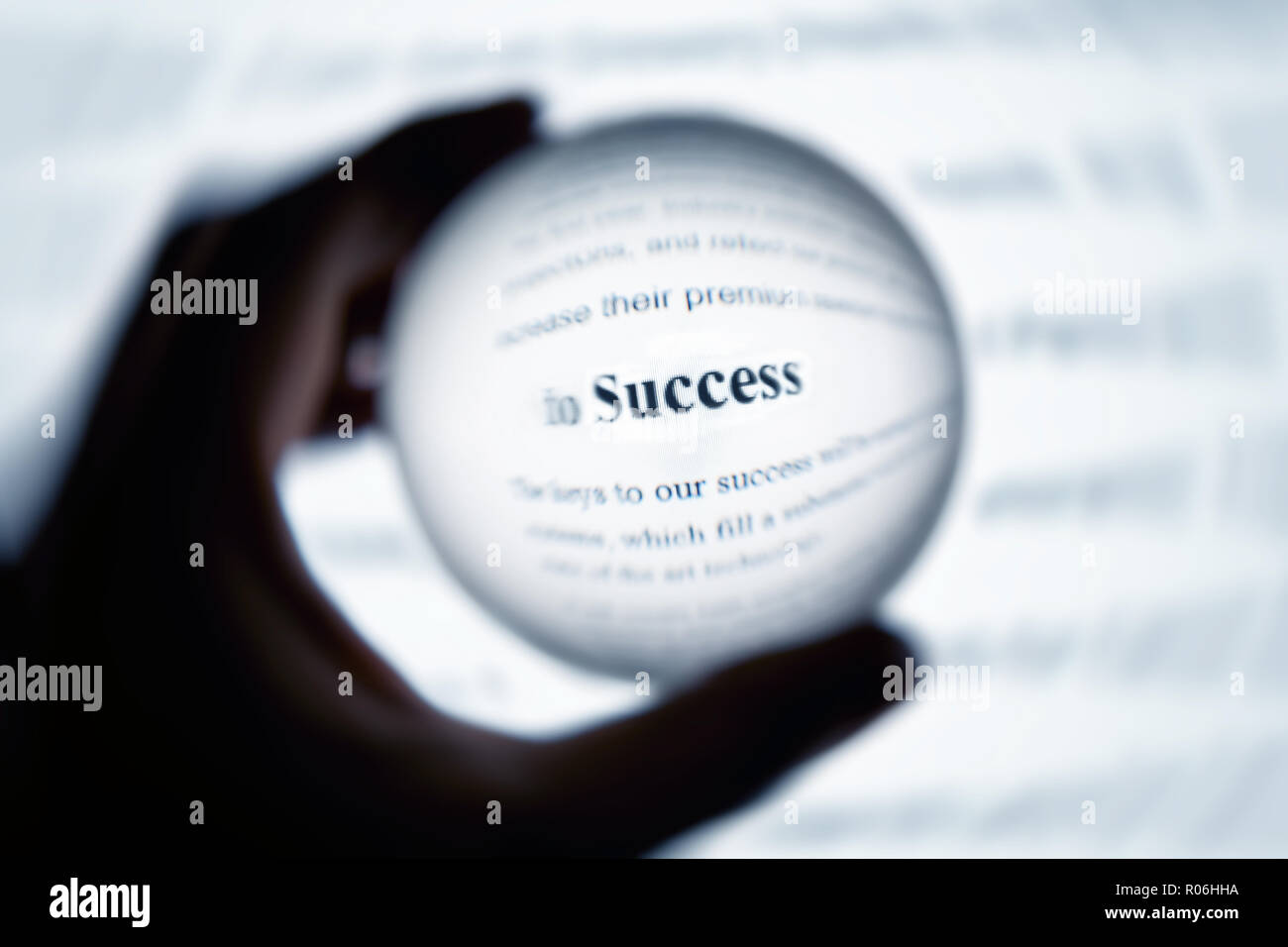 Crystal ball magnify computer screen word success. Stock Photo