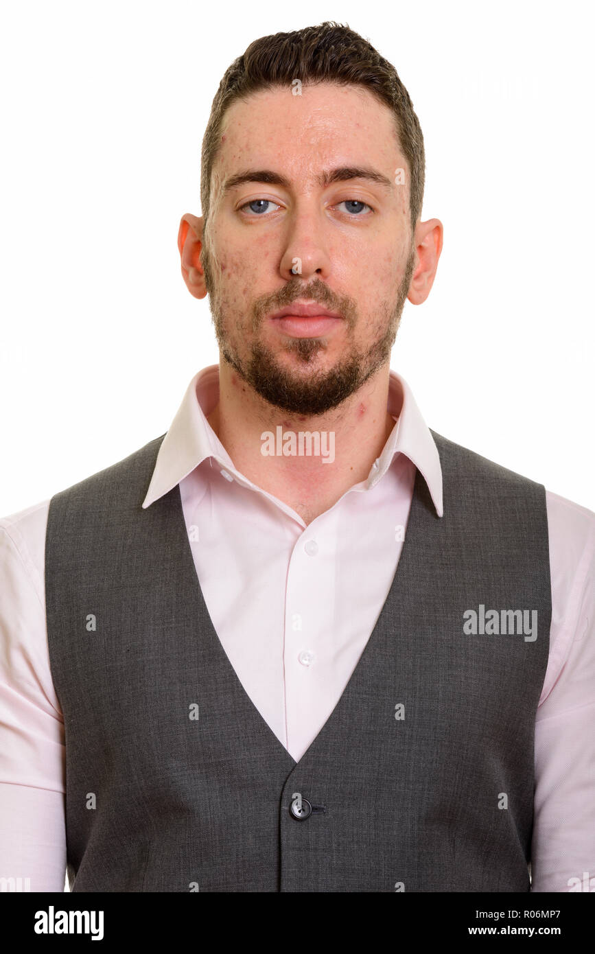 Young formal Caucasian man wearing vest looking at camera Stock Photo