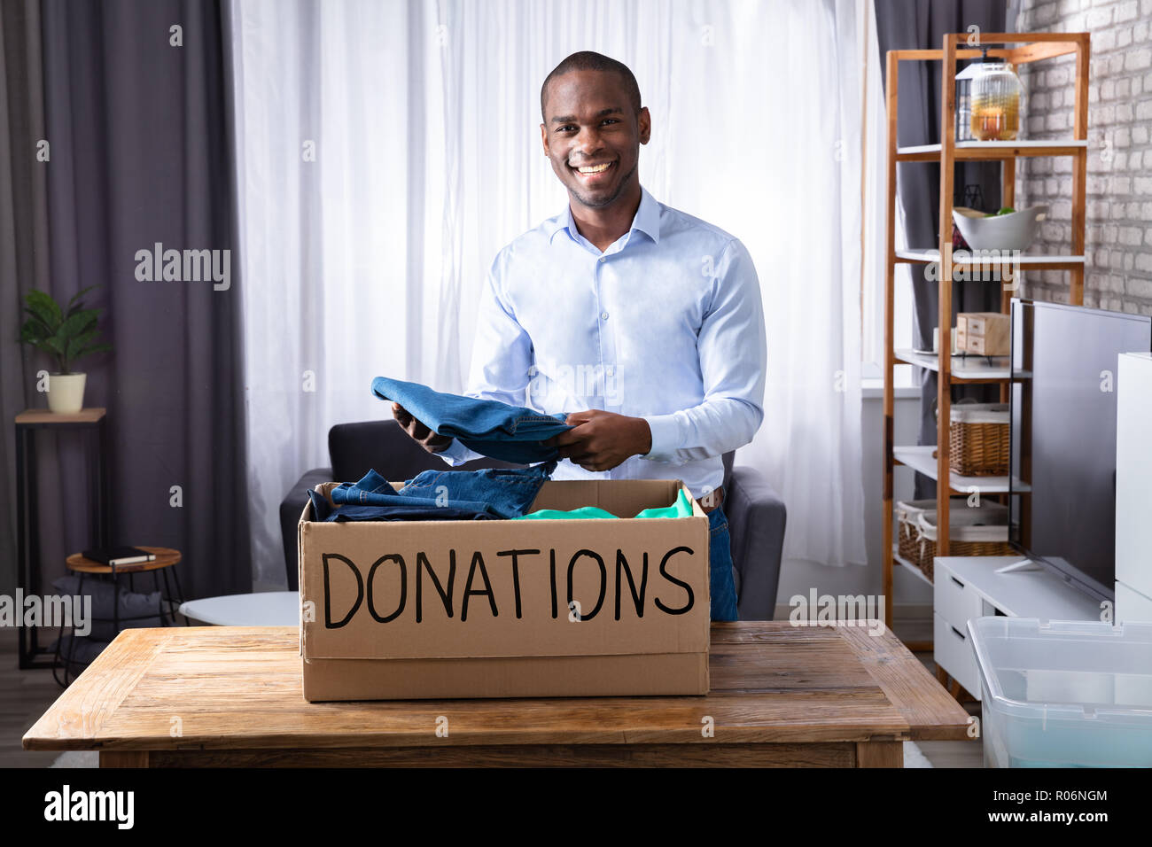Clothing donation box hi-res stock photography and images - Alamy