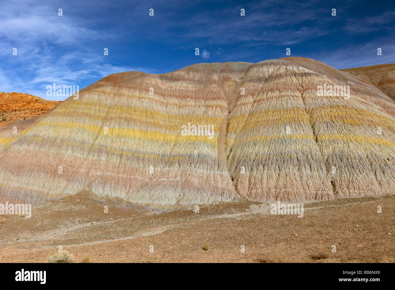 Badland topography formed by the Triassic Chinle Formation, ancient rivers and lakebeds with different compositions represented as rainbow-like ribbon Stock Photo