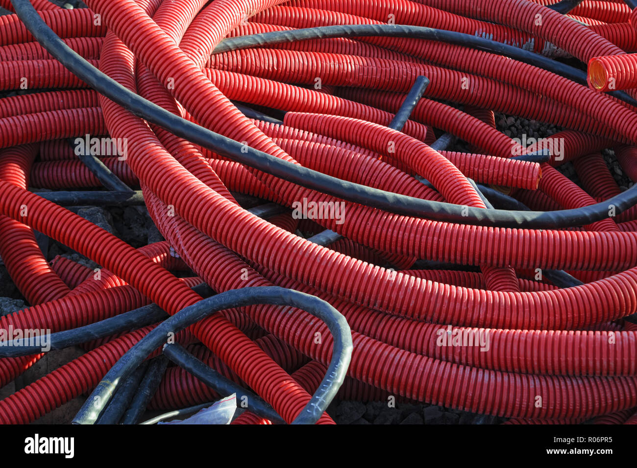 PVC corrugated pipes for cable lay on the construction site Stock Photo