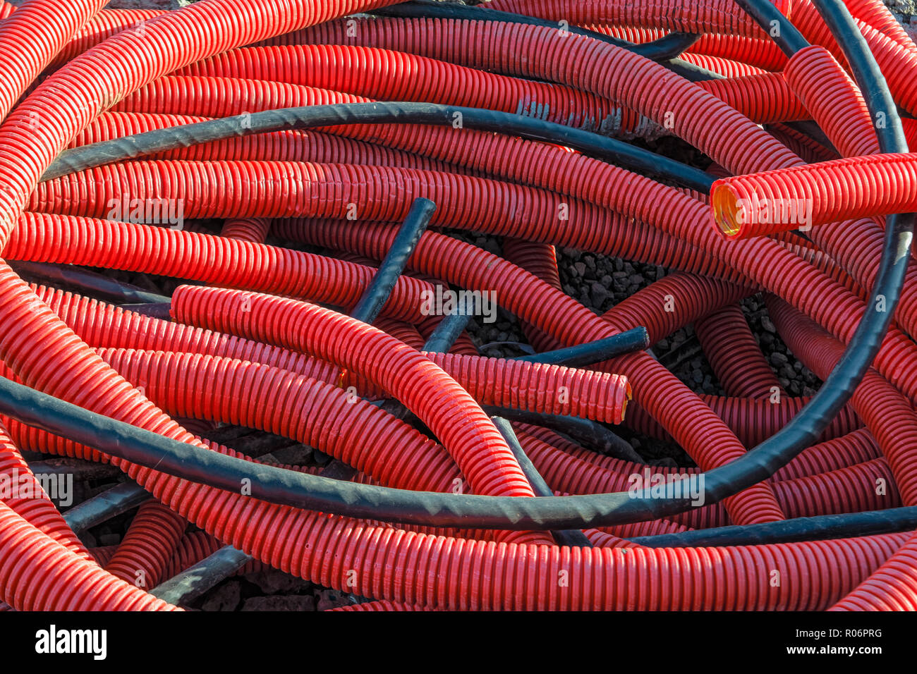 PVC corrugated pipes for cable lay on the construction site Stock Photo