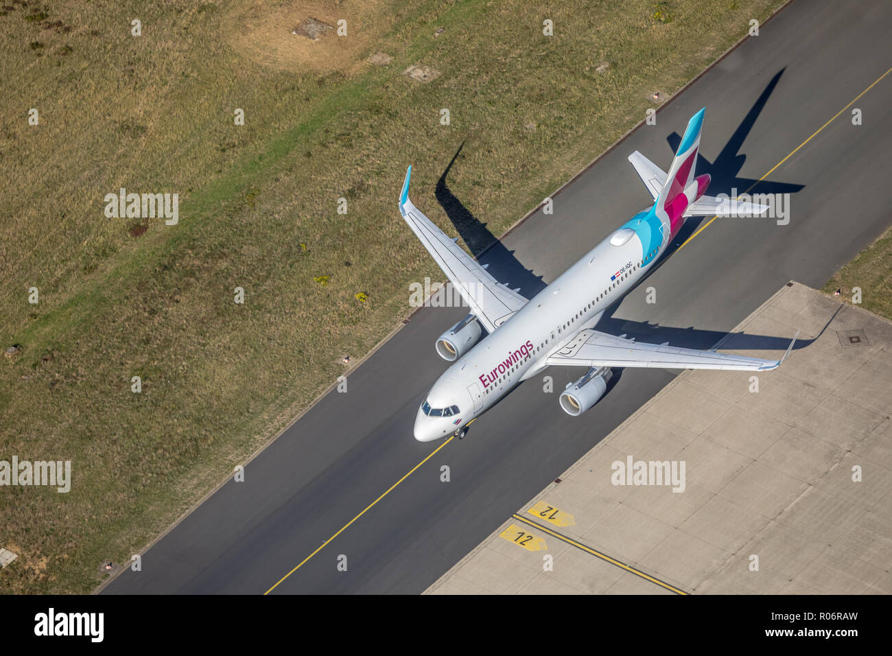 Aerial view, Eurowings Jet on the taxiway to the gate, Dortmund International Airport, DTM, overview of runway 06 and apron, apron, planespotting, Nat Stock Photo