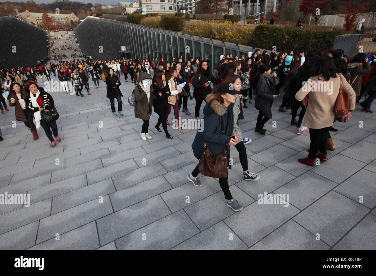 Hundreds of female students leaving Ewha womans university premises after school, South Korea. Stock Photo