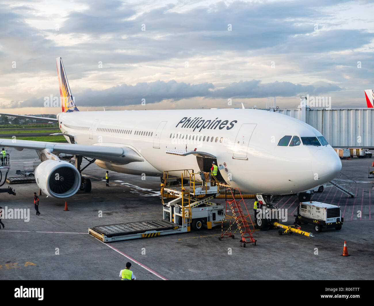 Philippine Airlines Airbus A330 at Ninoy Aquino International Airport, Terminal 2, being readied for departure. Stock Photo