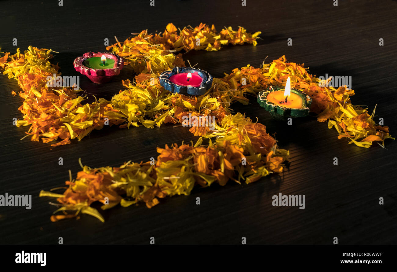 Lit diya arrannged for celebration of Diwali and dhantera Stock Photo
