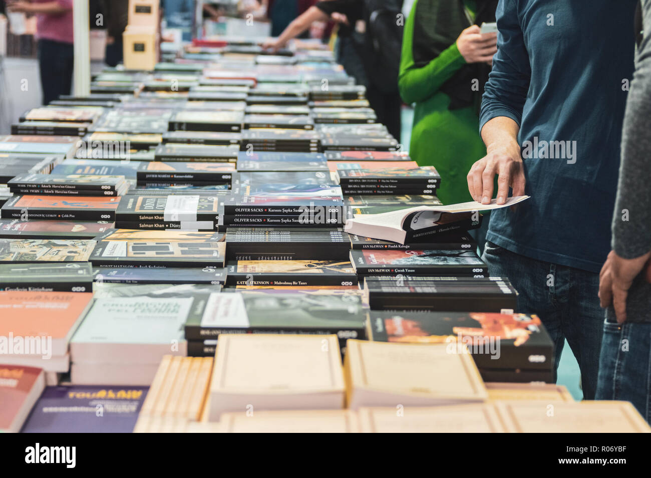 Eskisehir, Turkey - October 09, 2018: Caucasian man reading a book at Eskisehir Book Fair Stock Photo